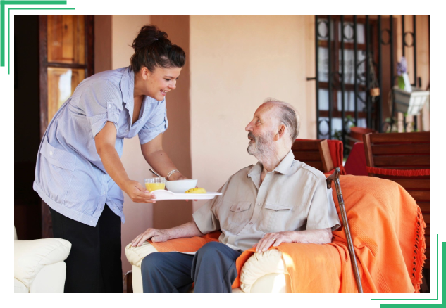 Serving food to elderly man